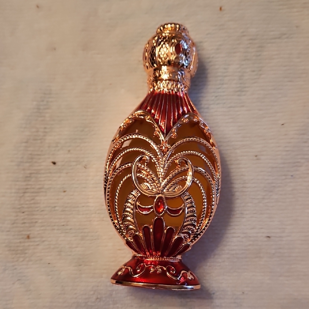 Ornate Red and Gold Perfume Bottle